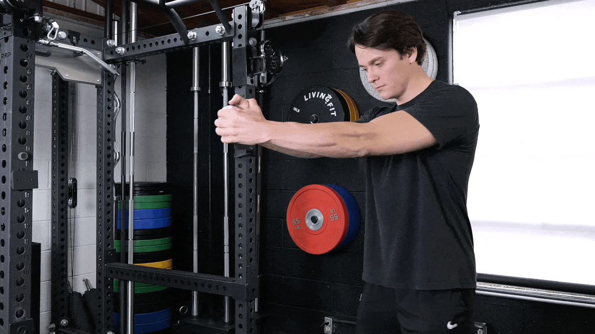 A person performing the pallof press exercise.