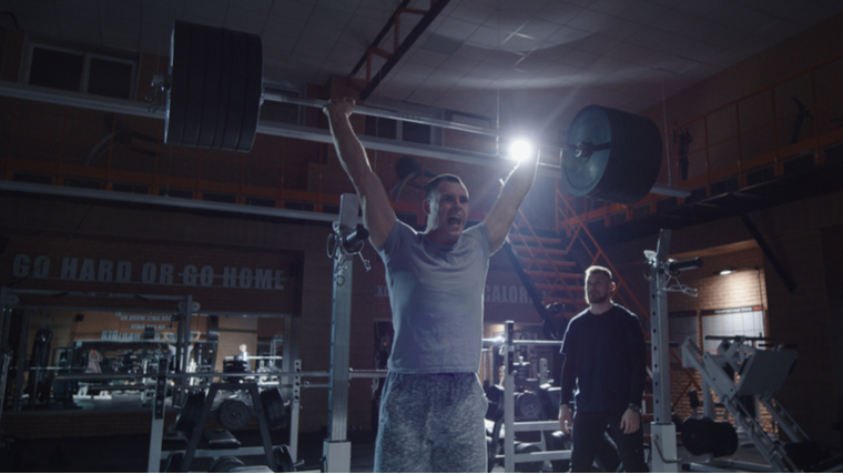 man performing push press 
