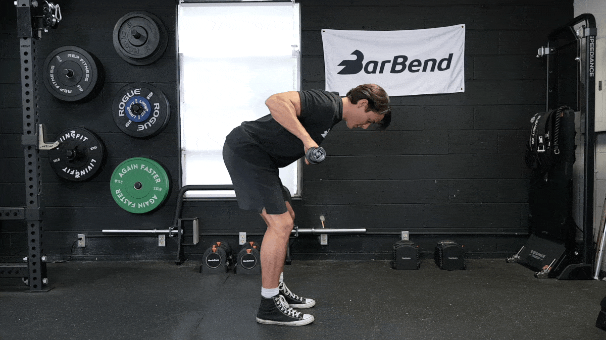 BarBend's Jake Herod performing the barbell row exercise.