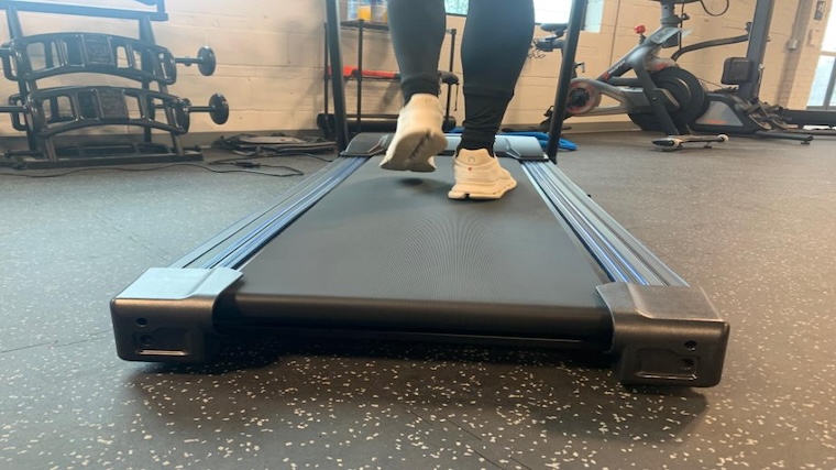 Our tester walking on the XTERRA Fitness TR150 deck.