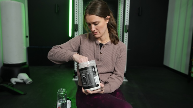 Our tester getting a scoop of Naked Micellar Casein