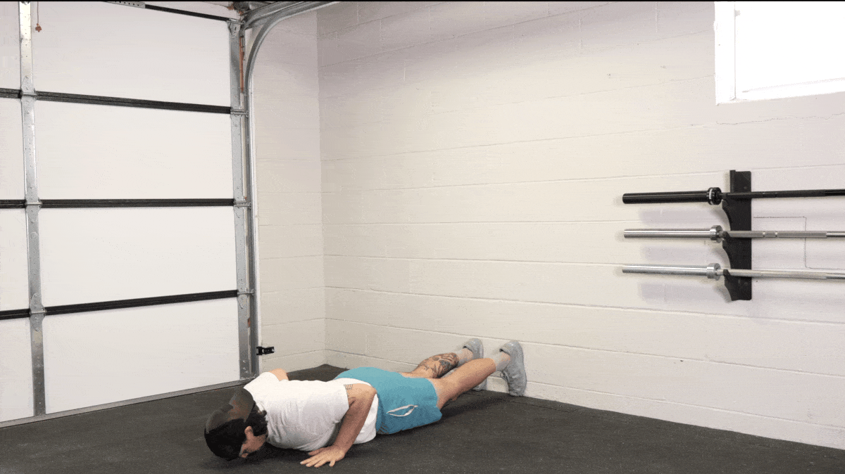 A person doing the wall walk. 