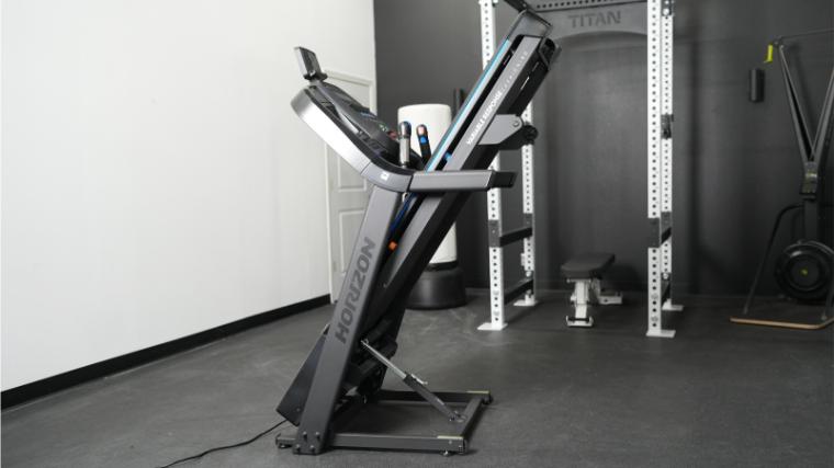 a treadmill with the deck folded upright