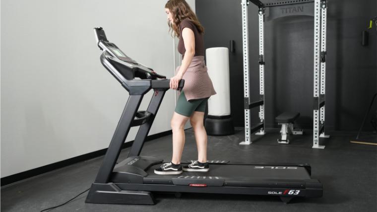Our tester on the Sole F63 Treadmill.