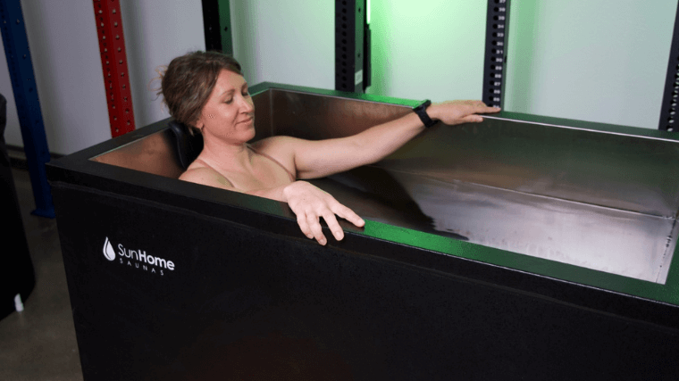 Our tester relaxing in the Sun Home Cold Plunge Pro